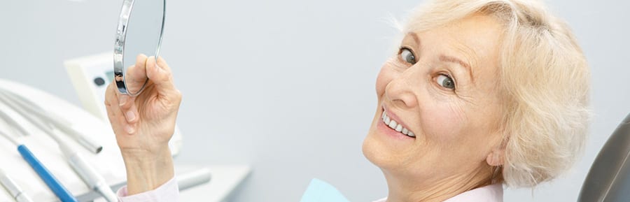 implant denture cost in Canada